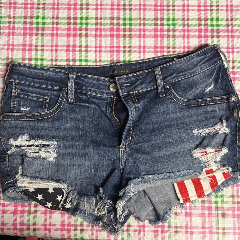 Silver Jeans Co. Blue Distressed Denim Shorts with Flag Patch